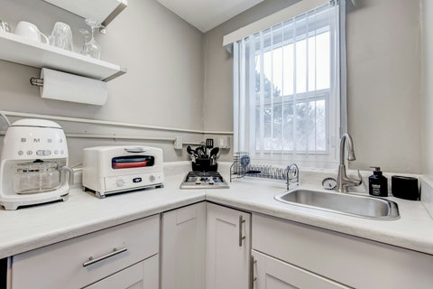 Smeg full-sized drip coffee maker, countertop oven with full functionalities, gas stove with two burners