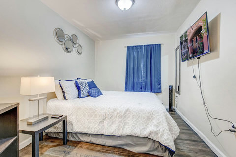 Smart HD TV with hundreds of cable channels, Netflix and more, and a tower fan to keep you cool.