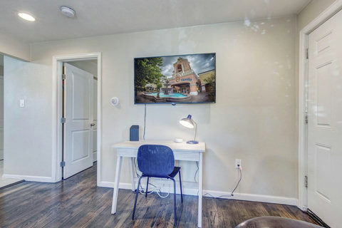 A dedicated work station with a desk and high-speed wi-fi. Smart HD TV providing hundreds of cable channels, Netflix, and more.