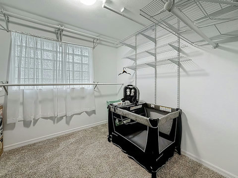 Master bedroom closet has Child Essentials