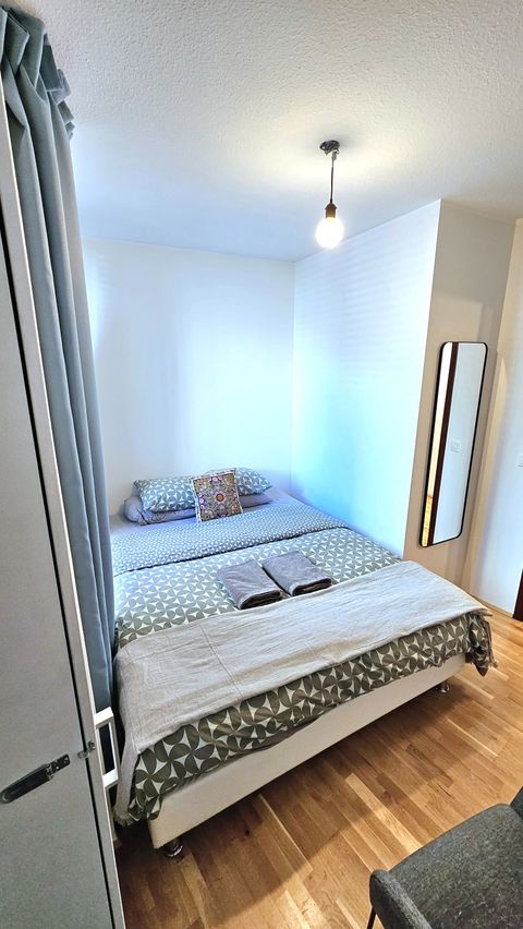 The second bedroom, which has a queen sized bed.