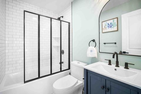 Full bathroom with tub/shower. 