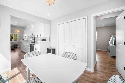 Laundry closet in dining room. 
