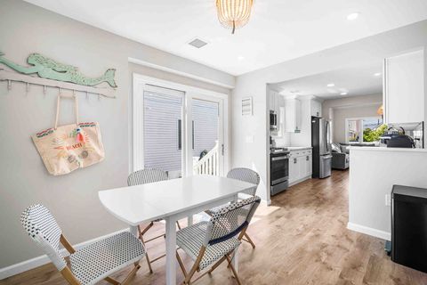 Dining room and view through the kitchen. 