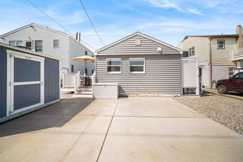 Backyard parking for two cars or utilize as large back patio. 