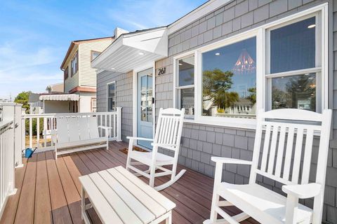 Front porch with seating for 4. 