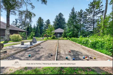 Private pétanque court surrounded by trees for fun outdoor afternoons