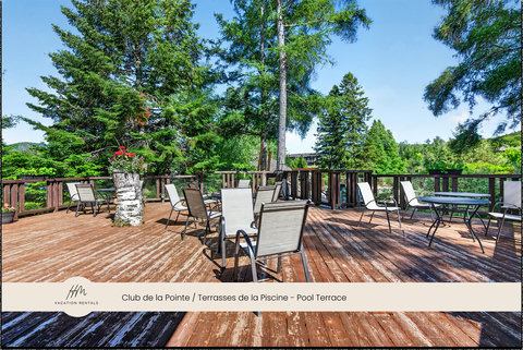 Spacious treetop terrace with outdoor seating for relaxing and dining