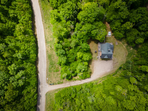 Secluded woodland cabin with private drive and peaceful forest setting