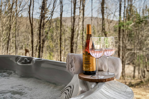 Secluded hot tub with forest views—perfect for sunset soaks and sips