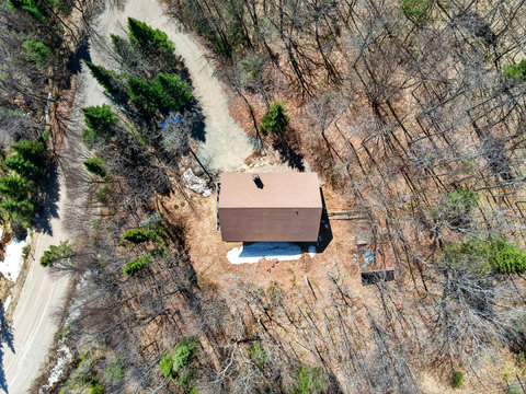 Secluded forest cabin off a quiet gravel road—privacy and nature views.