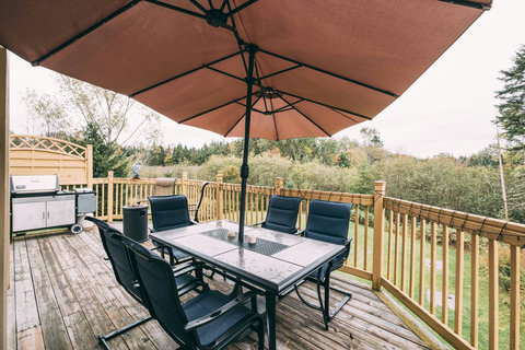 Main patio with sunshade, fireplace & BBQ grill