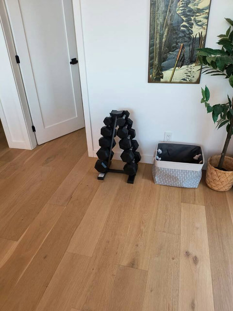 Wellness included: free weights and yoga mat provided.