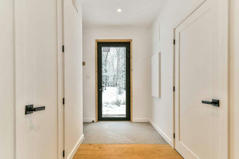 Front Entrance - Clean lines. Natural light. A perfect welcome.
