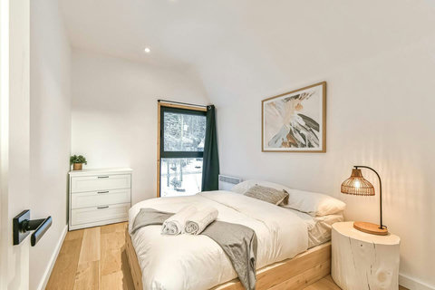 Bedroom 2 - Wake up to natural light or sleep in with blackout blinds in this second-floor bedroom.