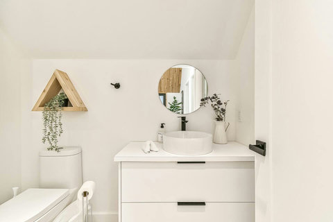 Conveniently located beside Bedrooms 2 and 3, this full bath includes a sleek stand-up rain shower.