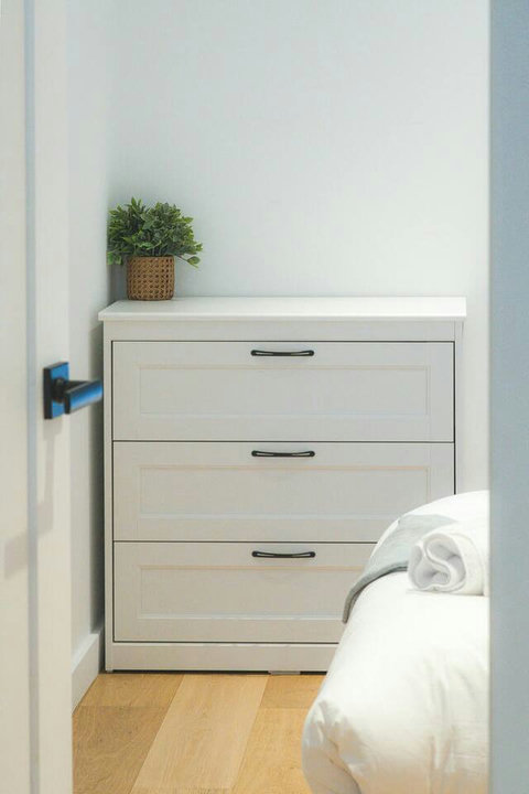 Thoughtful furnishings like this dresser make longer stays effortless.