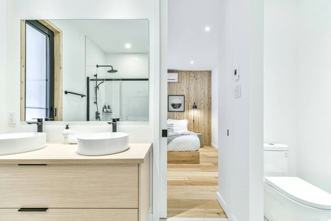 Enjoy the convenience of a private ensuite with modern design touches.