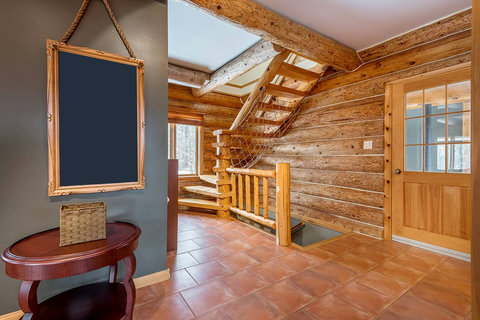 Main floor: Stairs to 2nd floor & Solarium entrance door