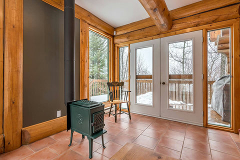 Main floor: Solarium with Fireplace