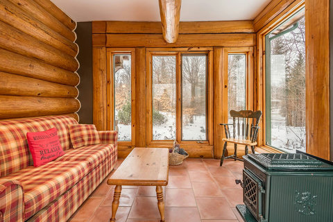 Main floor: Solarium with Fireplace