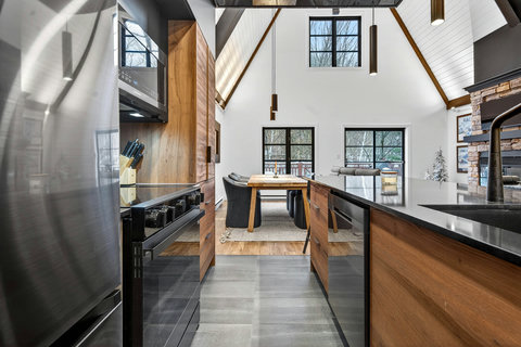Bright vaulted kitchen with modern finishes and airy dining space