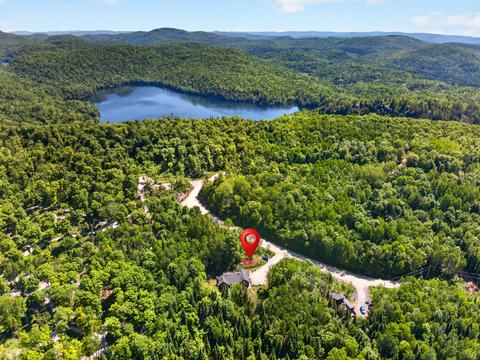 Private forest retreat with nearby lake and stunning mountain views