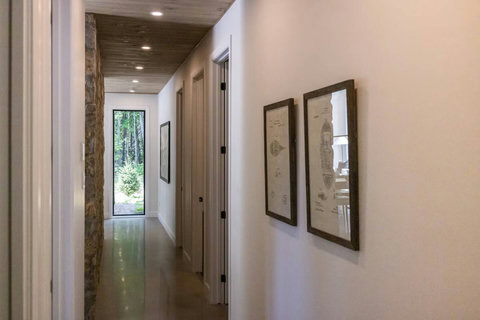 Corridor to the bedrooms and living room.