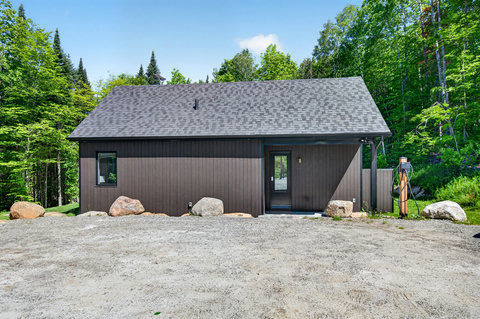 Modern forest cabin with private setting, parking, and EV charger