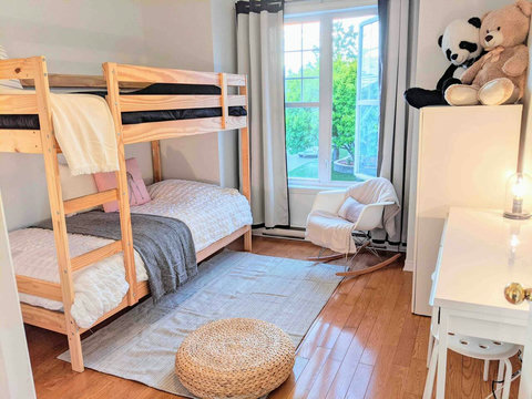 Bedroom with Bunk beds, a regular wardrobe, an extra mini wardrobe, and office desk