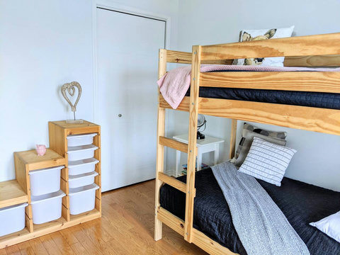 Bedroom with bunk beds, View on Toys/storage module, and wardrobe