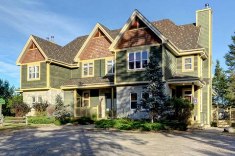 View of our Townhouse Chalet (far left one) along with 2 other townhouses, from the parking lot