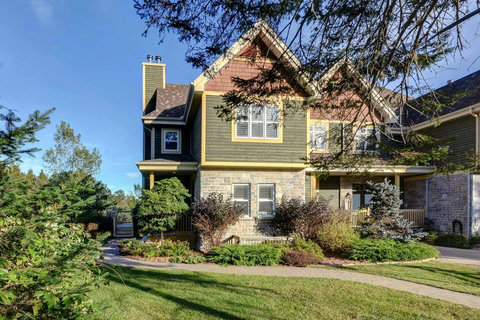 Summer front view of the Townhouse Chalet (the one on the left)