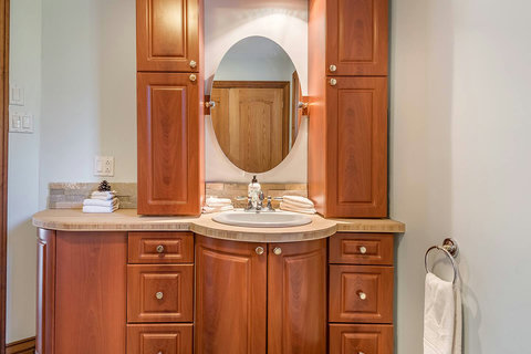 Main floor full bathroom with show and bath, equipped with all amenities