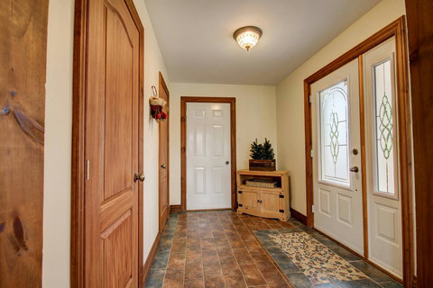 Entrance with closet and storage room: ski boots heater and fireplace wood logs included