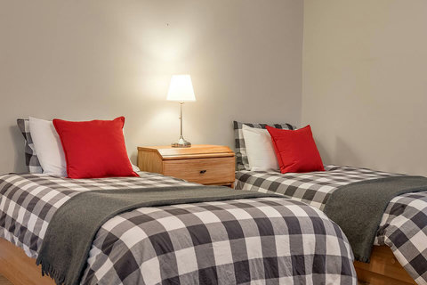 2 out of the 4 single beds close-up image