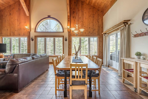 Dining room view with access to outdoor patio and BBQ