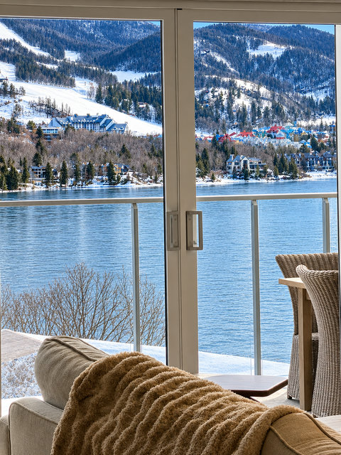 Lakefront balcony with stunning mountain and ski village views