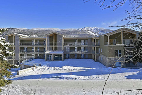 Spacious mountain condo with balconies and stunning snowy peak views
