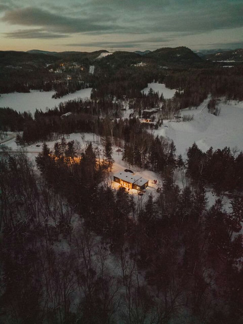 Your private forest retreat. A sleek, design-forward chalet just 15 minutes from Tremblant, surrounded by nature in every season.

