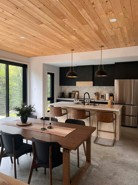 Cook, connect, and dine together in a modern kitchen made for memorable meals, from après-ski charcuterie boards to summer morning coffees.

