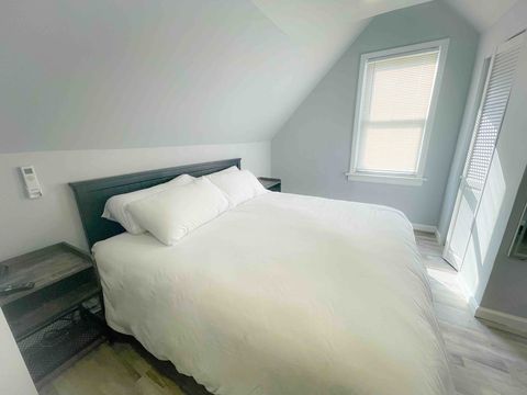 King size bed in a large spacious bedroom. Large walk in closet, LED full length mirror, dresser with led makeup mirror, adjustable stand up desk,  ergonomic chair, independent split air conditioning and heating unit, large 50 inches TV with Apple TV
