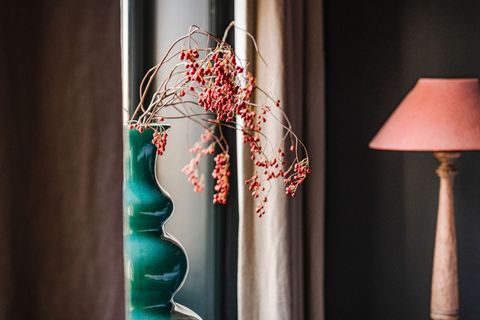 Bedroom scenery with outside view and decorations.