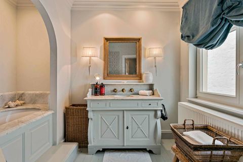 Luxe bathroom with bath & Rituals soap