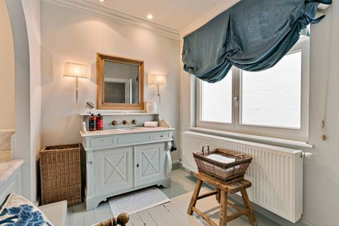 Luxe bathroom with bath & Rituals soap