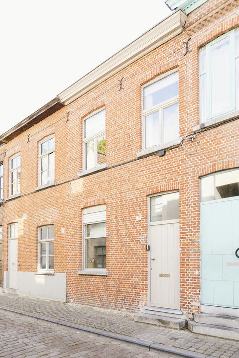 Classic Bruges brick townhouse on a quiet cobbled street, minutes from the Markt and the canals