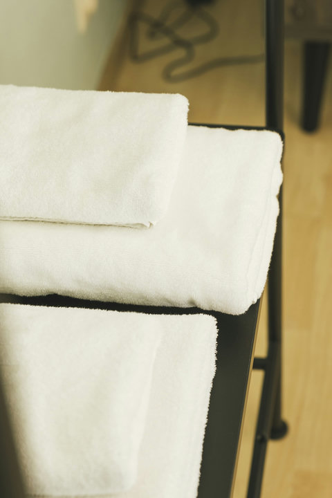 Fresh white towels provided for every guest