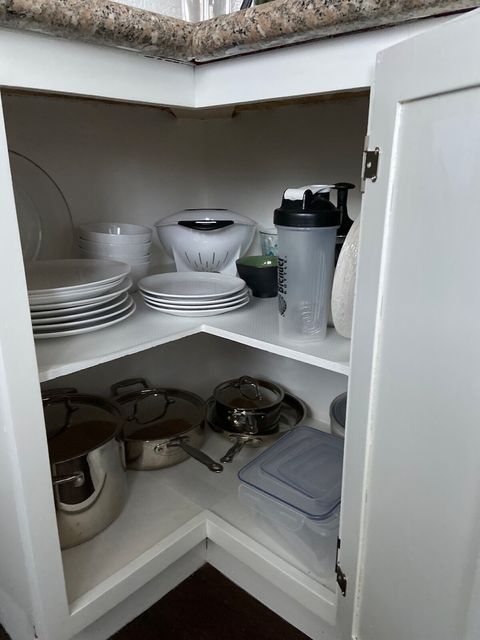 Fully stocked kitchen - pots, pans, dishes, mixing bowls, colander, measuring cup and spoons, baking pans, food storage.