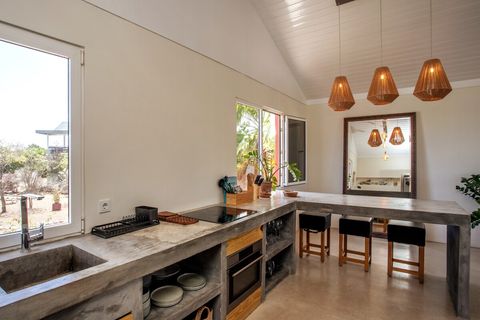 Beautiful large kitchen with a lot of cooking space.
