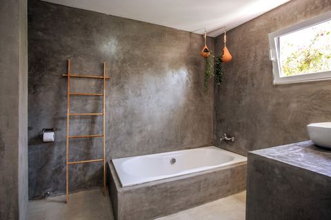 Large bathroom with bathtub.